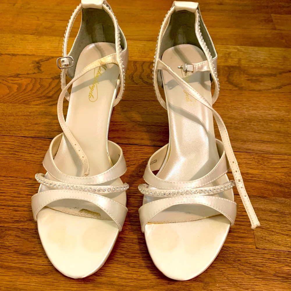 Beautiful David’s bridal cream high heels